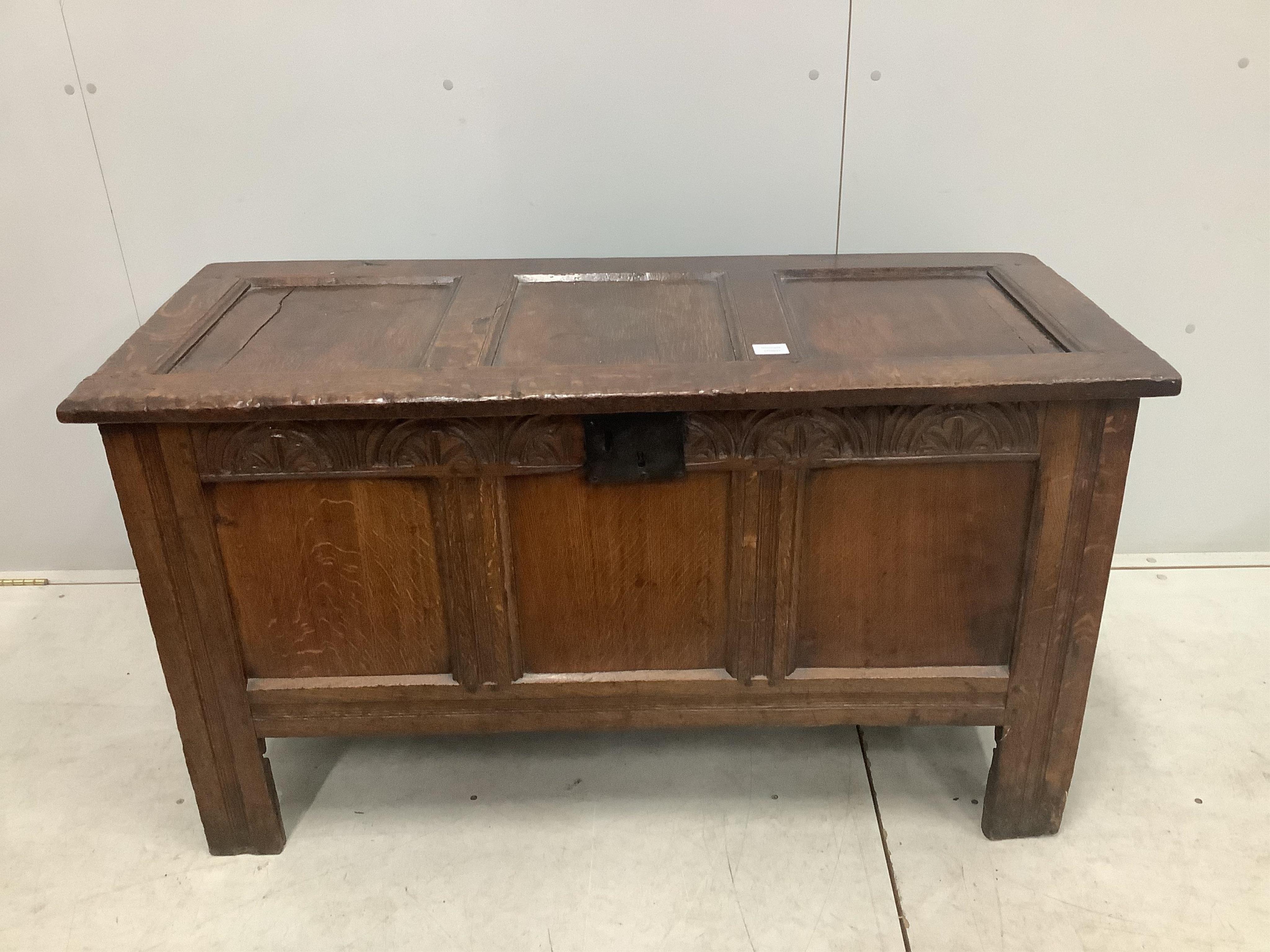 A late 17th century carved oak coffer, width 123cm, depth 53cm, height 70cm. Condition - fair